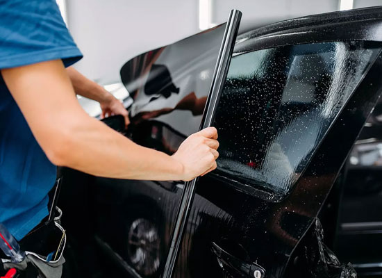 Window tint film installation — AutoFlow delivers tinting supplies and accessories to shops across the U.S.